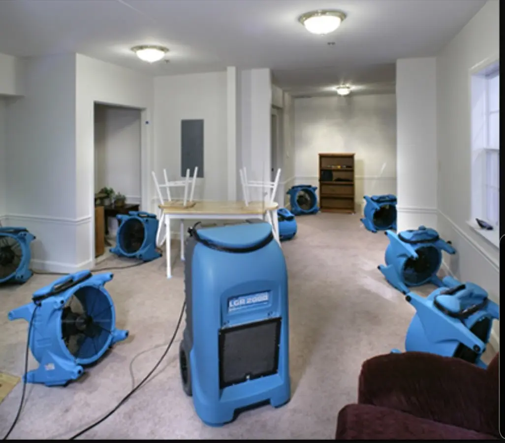 Air movers and dehumidifier setup for Water Extraction & Removal in Piqua